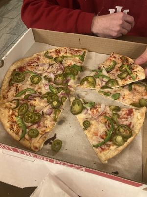 Build your own pizza with vegan cheese, green bell peppers, red onion & jalapeños. We quite enjoyed this, especially after a long, busy day!    at We Cook Pizza and Pasta in Tusayan