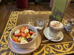 Fruit salad & caffè freddo  at Welt Cafe in Vienna