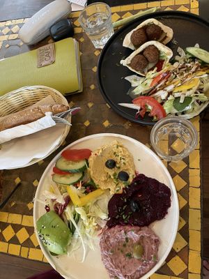 Hummus mix platter & Falafel Pita  at Welt Cafe in Vienna