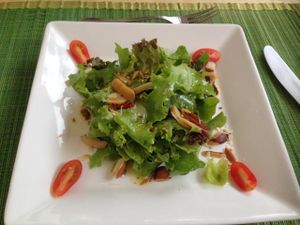 Entrance: salad with dried fruits. at Espaco Surya in Sao Paulo