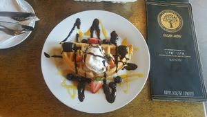 I haven't had a waffle since being diagnosed gluten intolerant. and I haven't had ice cream since going vegan... I nearly cried with happy when I saw this on the menu. And even more when I tasted it because it was even better than it looks!!! at The Hungry Herbivore in Western Cape
