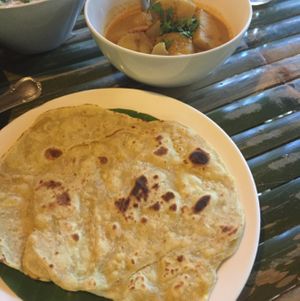potato and aubergine  curry with roti at Pun Pun Organic Vegetarian Restaurant in Chiang Mai