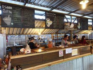 menu and counter at Pun Pun Market in Chiang Mai