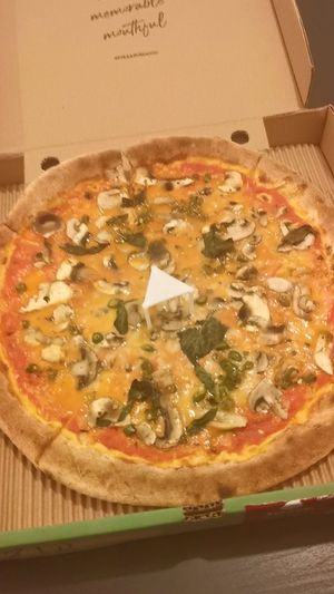 Vegan Margherita Funghi Pizza with Green Chilli at Pizza Di Rocco in Abu Dhabi