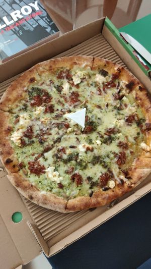 Whole wheat, double basil pesto, red pesto, vegan mozzarella, goat cheese, parmesan, pine nuts at Pizza Di Rocco in Abu Dhabi