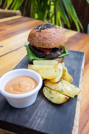 Black Bean Burger 🌱🍔   at Raw Love - Ahau Tulum Beach in Tulum