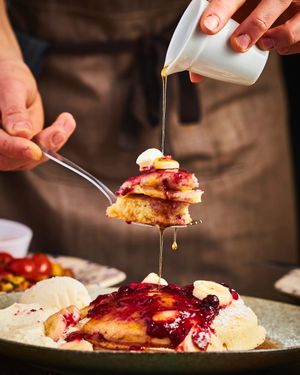Mixed berry & Banana pancakes - served with a vegan ice cream, vegan cream and maple syrup at The Pizza and Pasta Kitchen in Toongabbie
