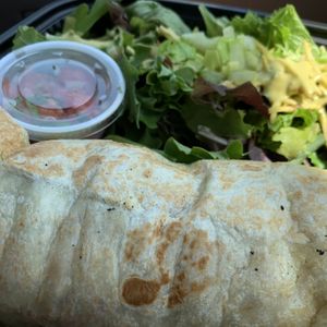 Tofu scramble burrito with salad at The Dancing Dog in Urbana