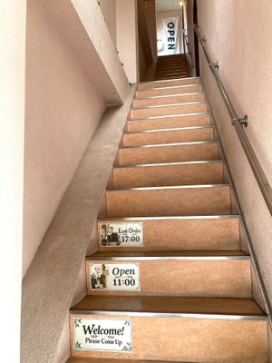 Follow the stairs to Ermine’s Kitchen on the 3rd floor. at Ermine's Kitchen in Kyoto