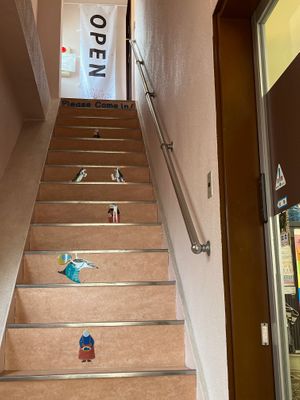 Little animal friends guide you up the stairs to Ermine’s Kitchen. at Ermine's Kitchen in Kyoto