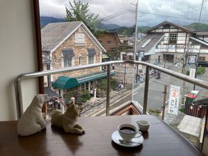 A quiet window seat at Ermine’s Kitchen, overlooking JR Saga-Arashiyama Station. at Ermine's Kitchen in Kyoto
