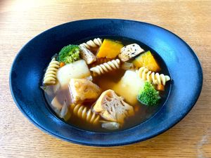 100% plant-based miso soup pasta with chewy mochi (Japanese rice cake), ganmodoki and sautéed vegetables.  at Ermine's Kitchen in Kyoto