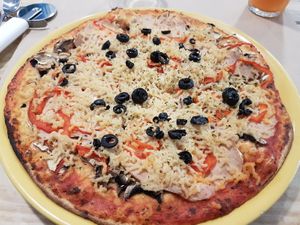 pizza funghi with extras  at Dolce Pizza y Los Veganos - Hipolit Lazaro in Barcelona