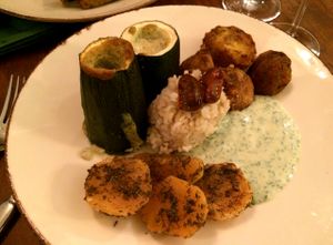 Baked zucchini with a ricotta filling, crispy roasted potatoes, turnips (I think) and rice with an herbed yogurt sauce at Bites and Wines in Antwerpen