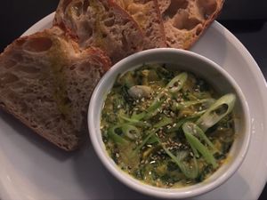 Artichoke dip with bread  at MARIA in Berlin