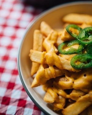 Cheese fries with homemade cashew cheese, gf. at MARIA in Berlin