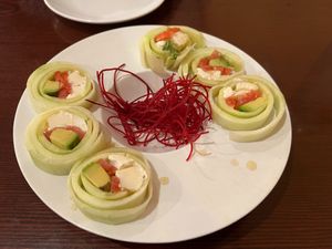 Vegano Appetizer- Tofutti cream cheese, avocado, tomato, and tofu wrapped in cucumber with homemade ponzu sauce at Sushiko in Jacksonville