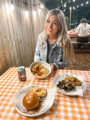 The outdoor area under tea lights 💡  at Dharma Southern Chick'n in Orlando