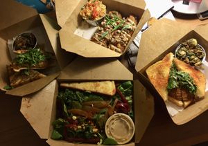 Chili dogs, fried green tomato sandwich, kale salad, jackfruit sandwich.  Alllll amazing! at Dharma Southern Chick'n in Orlando