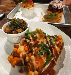 Chili dawgs, crisp Brussels sprouts, orange bird bbq, original mac n cheeze at Dharma Southern Chick'n in Orlando