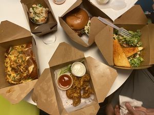 Chili hot dogs, potato salad, sloppy Joe, Kale salad and Dippers with buffalo sauce and blue cheese  at Dharma Southern Chick'n in Orlando
