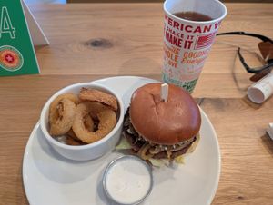 Steakhouse Burger, onion rings, and iced tea at Veggie Grill by Next Level - Tustin Marketplace in Irvine