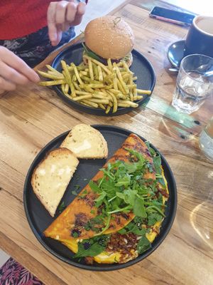 Breakfast burger with side of fries & the omelette at Adam & Eve in Bendigo
