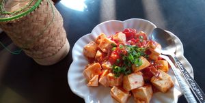 Tofu with tomato sauce and sticky rice  at Lai's Place in Luang Namtha