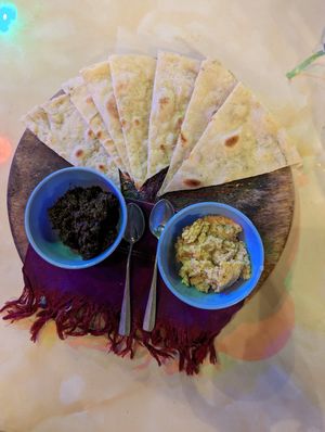 Homemade bread with dips (hummus and pesto) at Bamboo Lounge - Forest Retreat in Luang Namtha