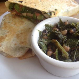 buffalo chix wrap with side of black eyed peas & greens at Garden Truck in Jacksonville