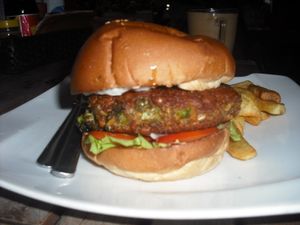 Vegan lentil burger with chips at Bookworm's Coffee in Ho Chi Minh City