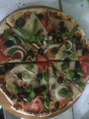 Vegan cheese pizza at Bookworm's Coffee in Ho Chi Minh City