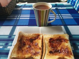 Marmite on toast with vegan butter. Plus Yorkshire Tea with soya milk at Bookworm's Coffee in Ho Chi Minh City