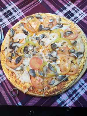 Delicious vegan pizza at Bookworm's Coffee in Ho Chi Minh City