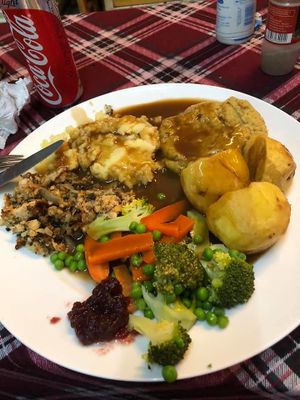 Vegan Christmas Dinner: Main meal: Vegan sage bake, vegan stuffing, cranberry sauce, roast potatoes, mash potatoes, peas, broccoli, carrots, vegan gravy.  at Bookworm's Coffee in Ho Chi Minh City