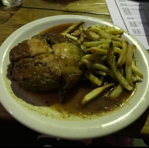 Burger with french fries at Boteco Ouzar in Sao Paulo