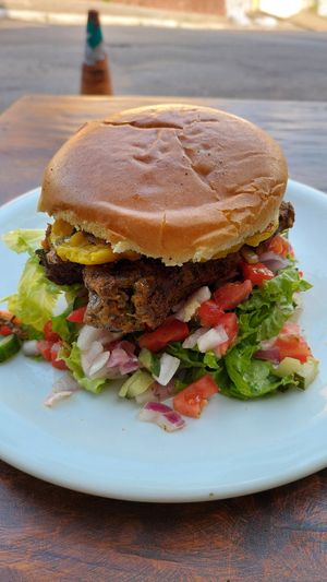 X-Linguiça de shimeji com vinagrete at Boteco Ouzar in Sao Paulo