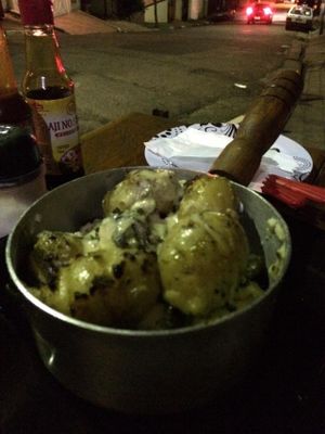 ''Batata Ouzar'': potato with cheese and broccoli. at Boteco Ouzar in Sao Paulo