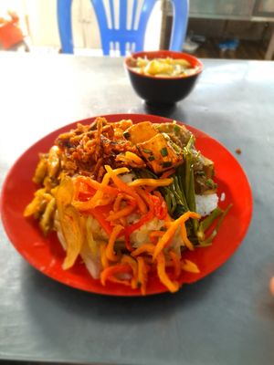 Com chay consists of rice, vegetables, fake meats and tofu at Quán Cơm Chay Việt in Ho Chi Minh City