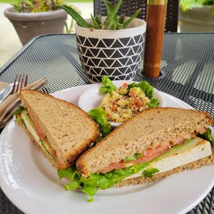 Tofu sandwich with quinoa cucumber salad. at Bay Naturals Healthy Market & Kitchen in Myrtle Beach