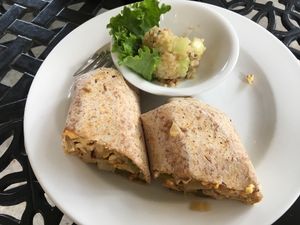 Philly cheesesteak wrap (made with tempeh!). The cucumber quinoa salad is bomb.  at Bay Naturals Healthy Market & Kitchen in Myrtle Beach