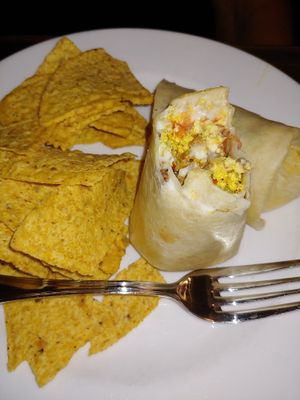 All day burrito with chips at Bay Naturals Healthy Market & Kitchen in Myrtle Beach