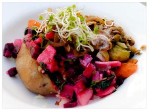 Kumpir with carrots, lentil salad, beetroot-apple salad, mushrooms, sweet onions and sprouds. at Patiti Patati in Berlin
