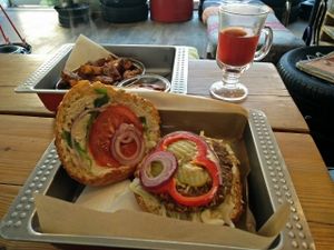 celery burger and baked potatoes at Chwast Food in Warsaw