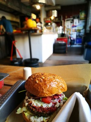 Mushroom burger with a view to the inside at Chwast Food in Warsaw