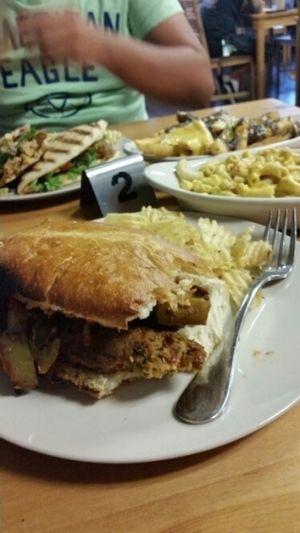 sausage and peppers, panini, disco fries, and mac and cheese! at Killer Vegan in Union
