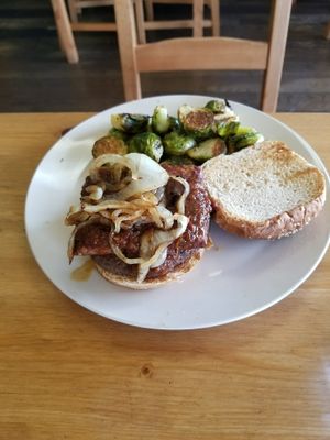 Gunslinger sandwich with side of brussel sprouts at Killer Vegan in Union