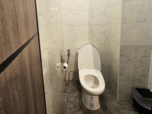Superior Double Room with Balcony has shared bathrooms with clean toilet seat at Ubuntu Live Boutique Hostel & Rooms in Phuket