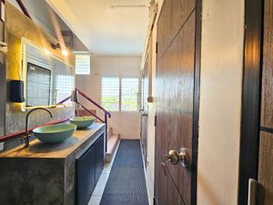 Superior Double Room with Balcony has shared modern bathrooms at Ubuntu Live Boutique Hostel & Rooms in Phuket