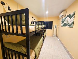 Bed in 4-Bed Female Dormitory Room providing a lovely space for females at Ubuntu Live Boutique Hostel & Rooms in Phuket